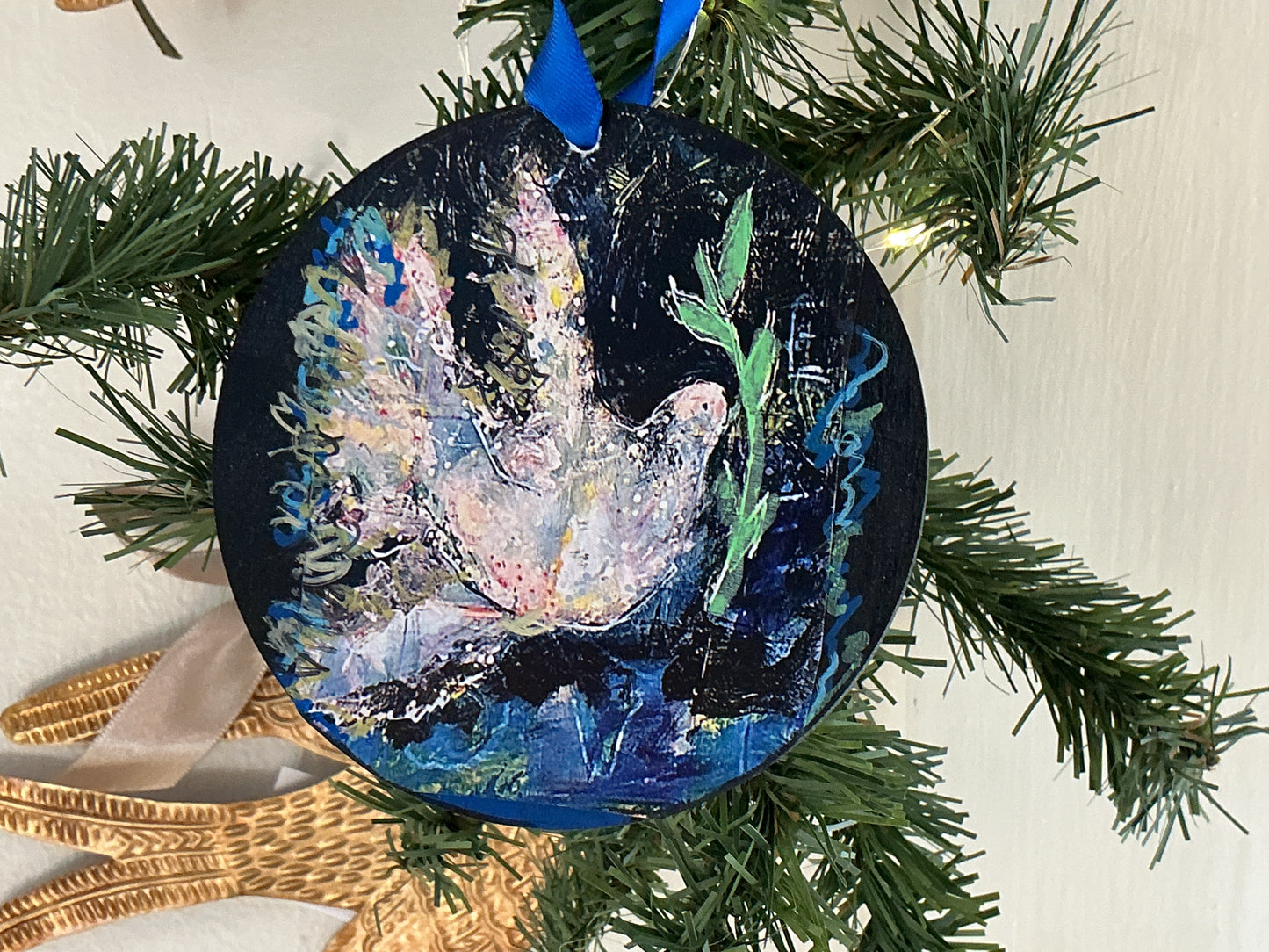Peace ornament by Dinah Rhodes